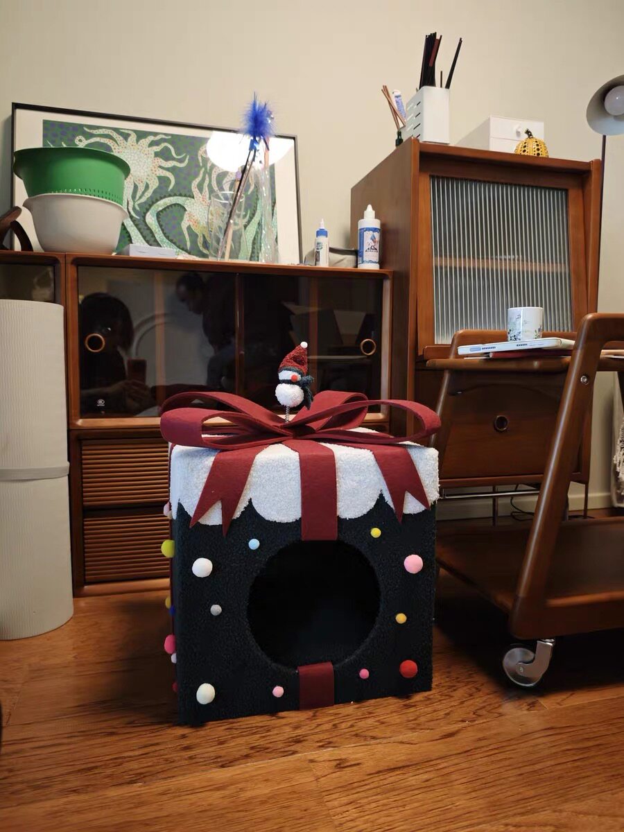 Weihnachtsüberraschungs-Geschenkbox Katzenbett